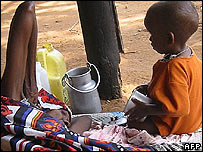 A Somali boy and woman at a refugee camp in Kenya